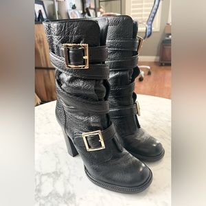 Tory Burch black leather boots with gold hardware